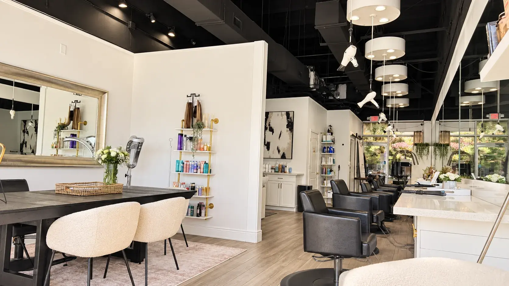 The Nine Zero Four salon floor, with the retail shelves